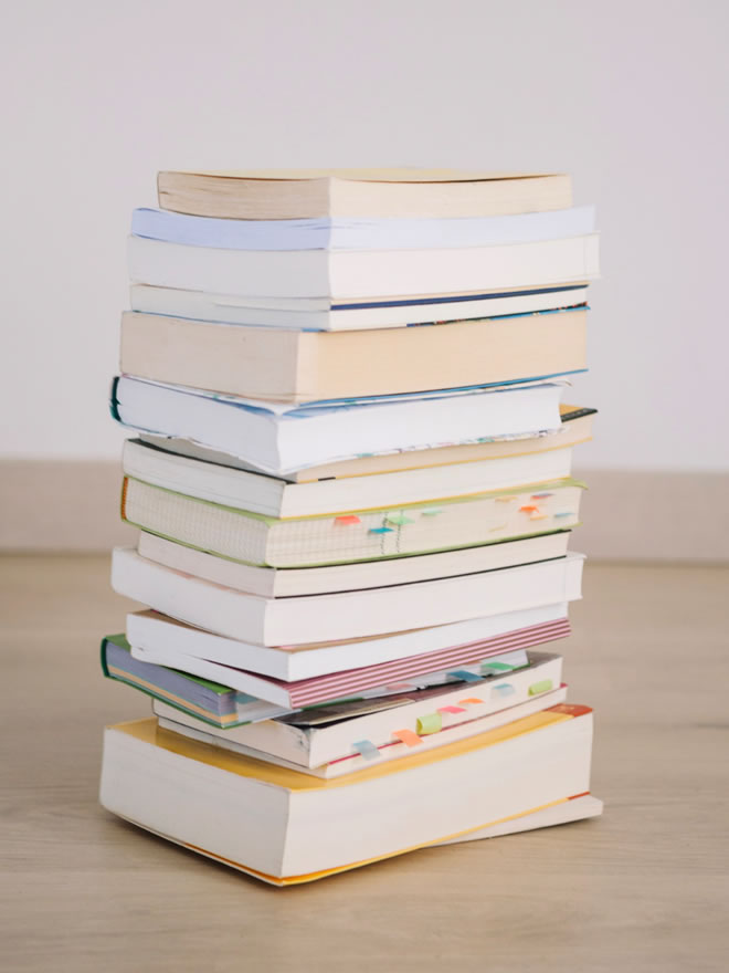 unfolding learning stack of books